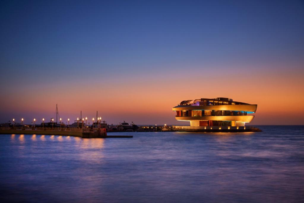 Four Seasons Hotel Ντόχα Εξωτερικό φωτογραφία The casino at night